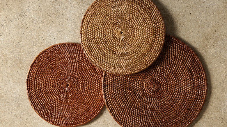 three round dried grass placemats