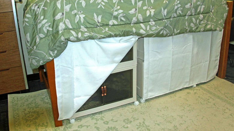 Dorm bed with curtain panels