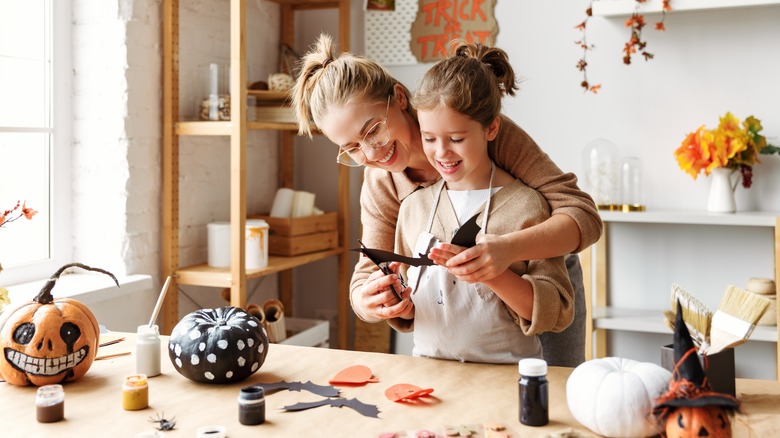 mother and daughter crafting together