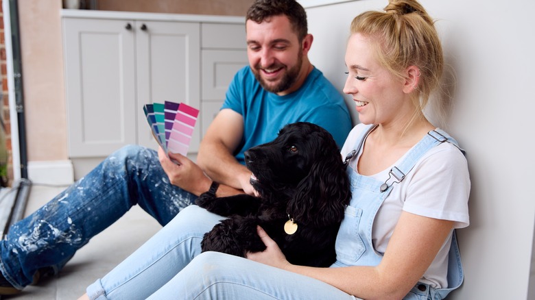 Couple choosing colors for kitchen