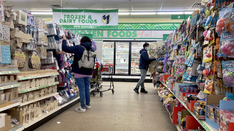 people shopping in dollar tree