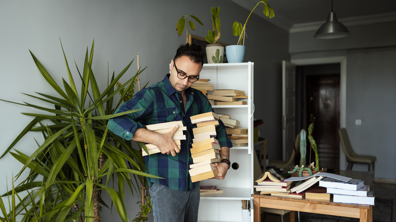 man with books