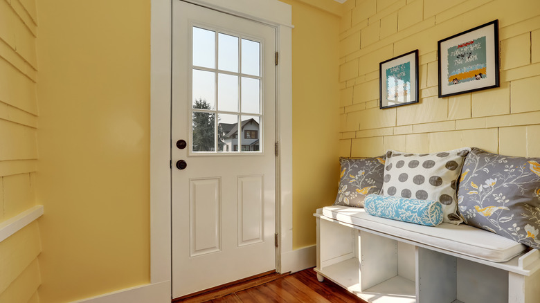 small entryway with shoe storage