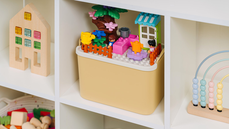 shelf with Lego toys on it