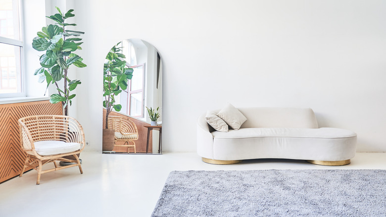 arched mirror in a living room