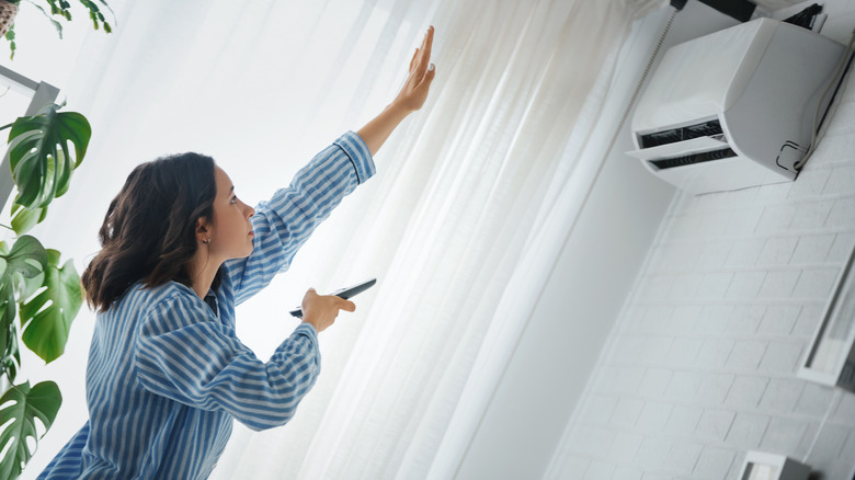 woman changing temperature
