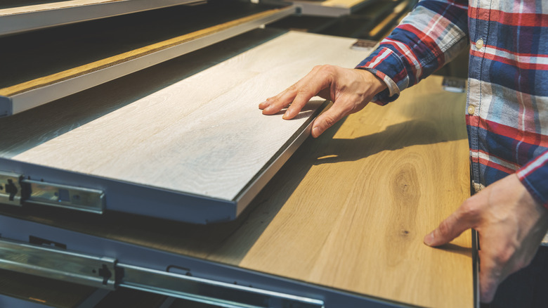 person selecting countertops