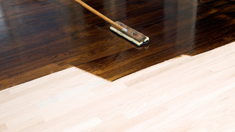 wood floor being stained