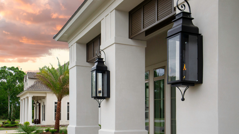 Gas lamps on home exterior