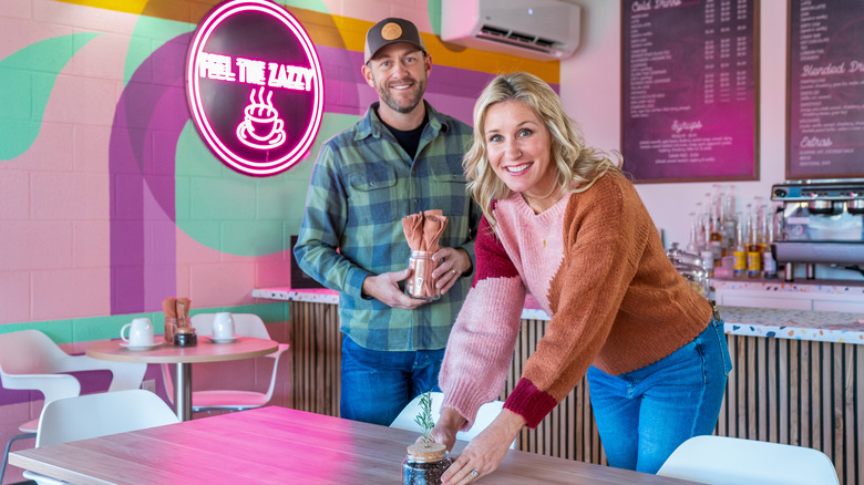 Dave and Jenny Marrs posing in cafe