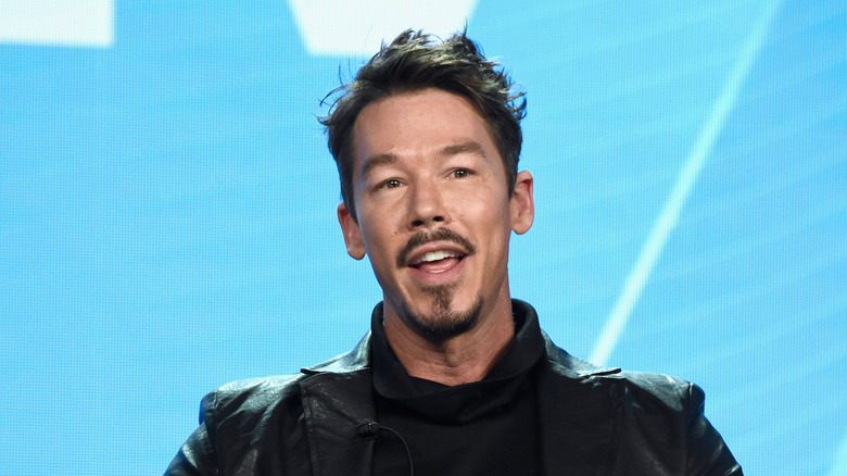 David Bromstad smiling while talking