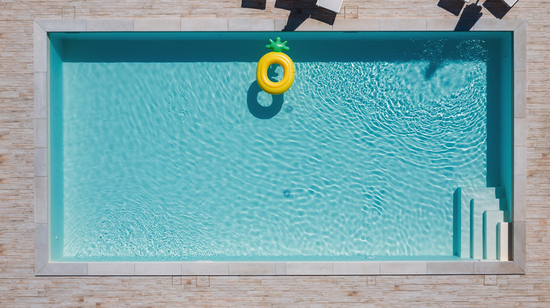 pool with pineapple floaty