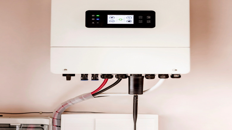 Solar inverter displaying green light and power generation
