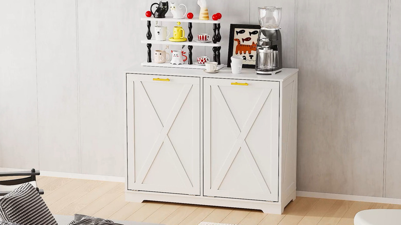 Laundry-cabinet-turned-coffee-station with cups and coffee on it