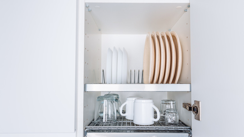 Organized kitchen cabinet with limited inventory
