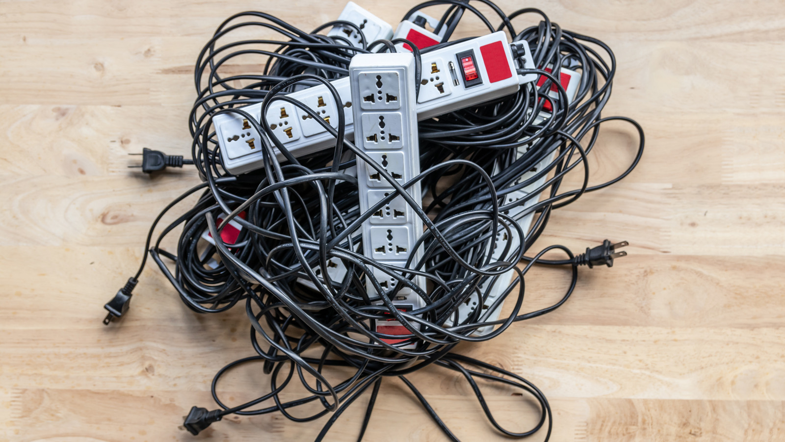 Declutter & Organize Extension Cords With A Garage Bungee Cord Storage