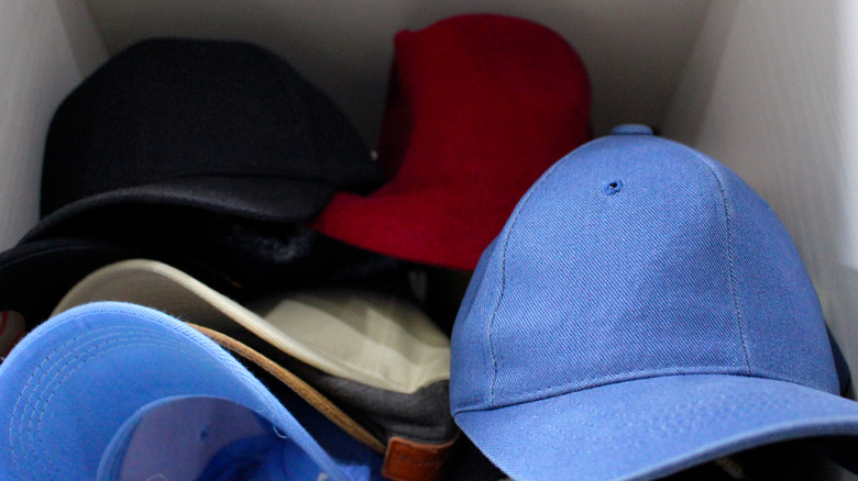 Pile of baseball caps