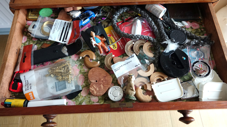 A junk drawer filled with disparate items
