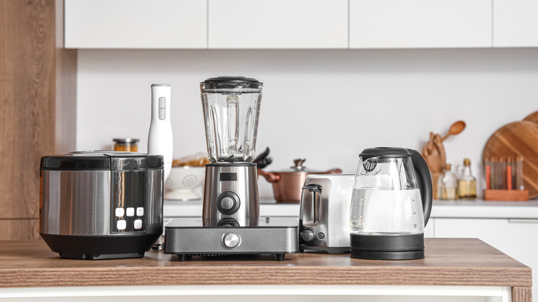 Set of appliances sitting on a kitchen countertop