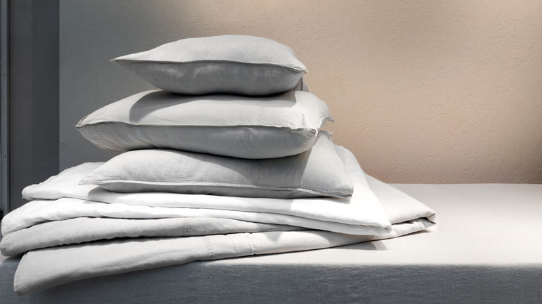 Stack of pillows and pillowcases