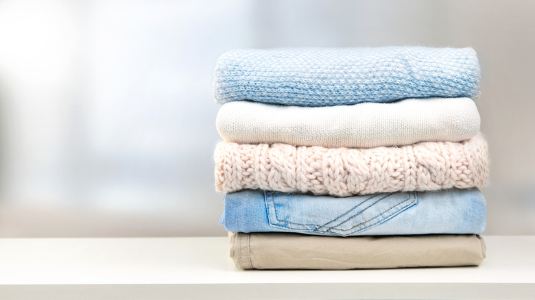 A stack of folded seasonal clothes