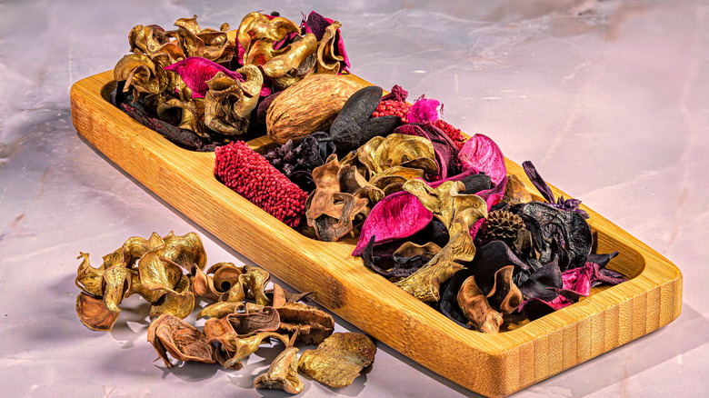 A colorful wooden bowl of spring potpourri