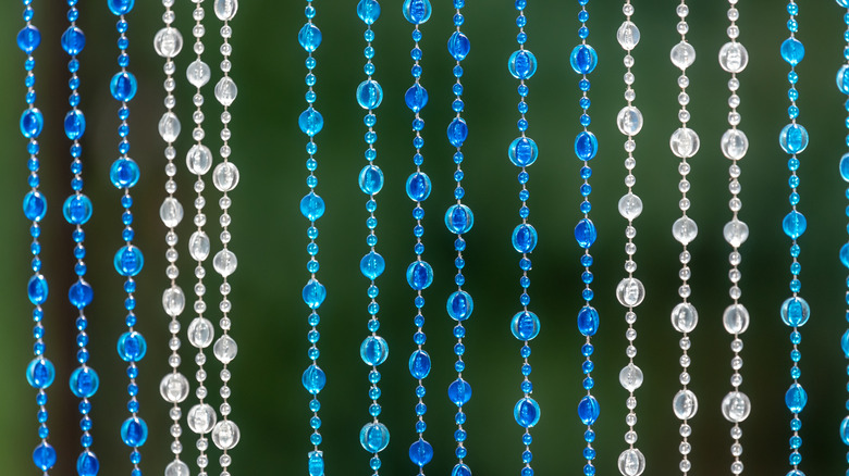 Beaded blue and white curtain strands