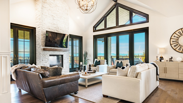 The interior of a white and black living room.