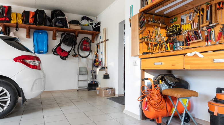 Garage with car and items