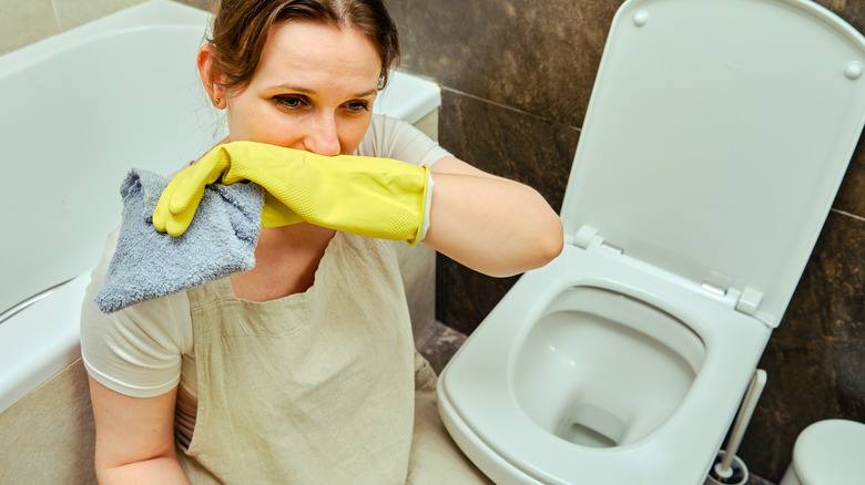woman offended by toilet smell