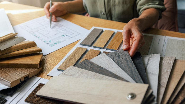 Interior designer comparing types and colors