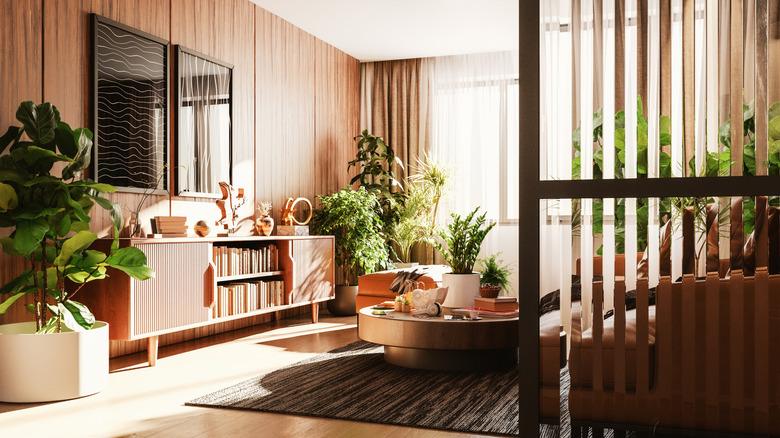 Living room with wooden floors and wooden wall
