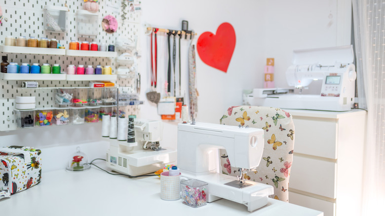 A bright and organized sewing corner with a sewing machine