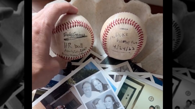 A close-up of Joanna Gaines touching a signed baseball in her memory bowl.