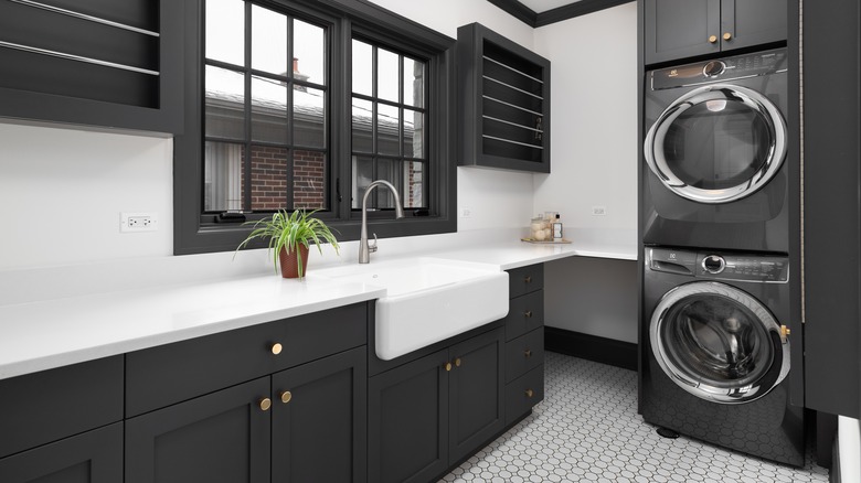 black cabinets in laundry room