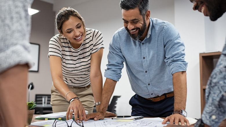 Man and woman looking at plans