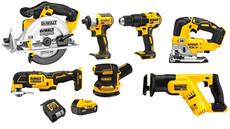 An assortment of DeWalt power tools and their batteries