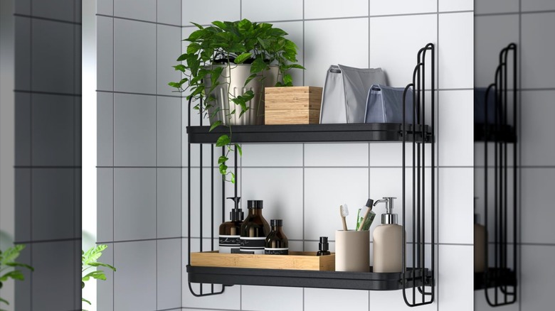 APOTEKARE Wall shelf in bathroom setting with plant, soap pump, toothbrush holder