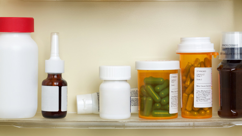 close up of medicine in a bathroom cabinet