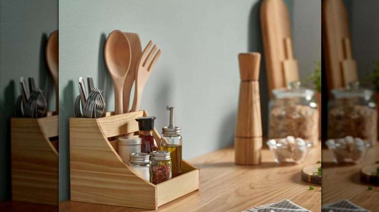 IKEA CHOKLADHAJ on kitchen counter with utensils and spice bottles