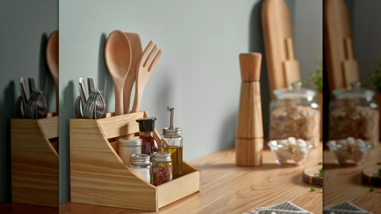 IKEA CHOKLADHAJ on kitchen counter with utensils and spice bottles