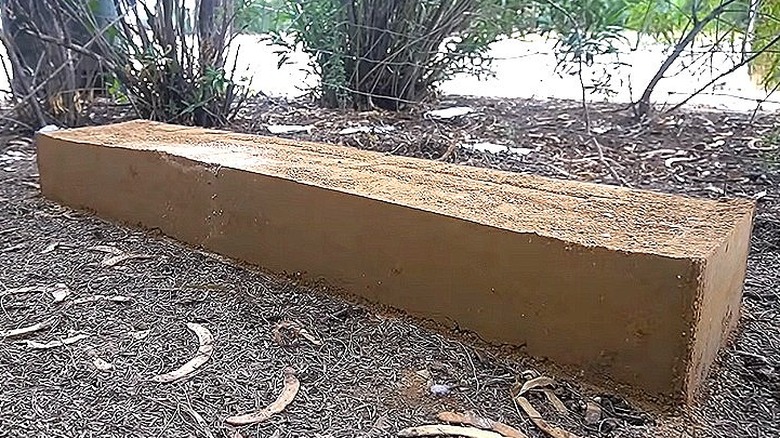 An example of a low wall made from rammed earth