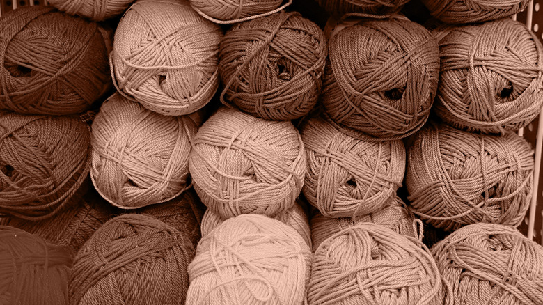 Rolls of wool yarn in natural brown tones