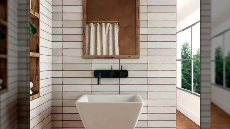 a bathroom wall with a stacked horizontal tile offers a modern look