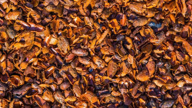 Cocoa hulls, showing their dark, rich color.