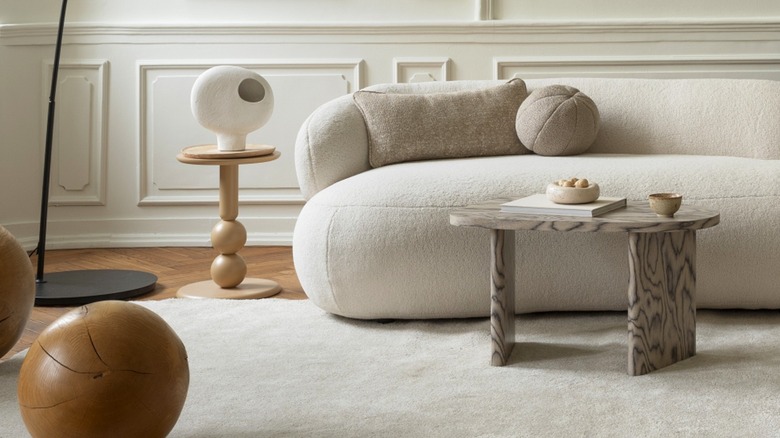 Modern living room with abstract end table and coffee table