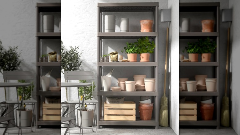 IKEA RUNMARÖ on a patio, stocked with a variety of pots, plants, and gardening supplies