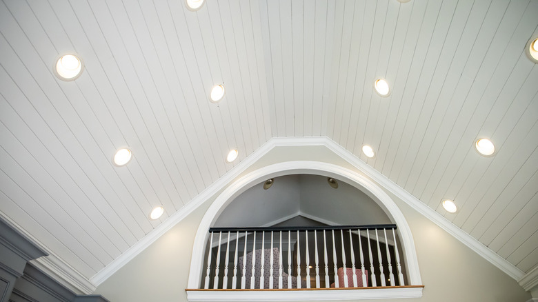 Living room with beadboard ceiling