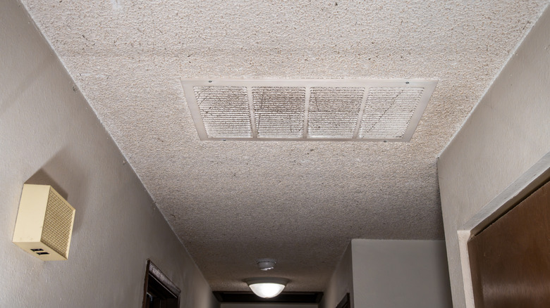 Hallway with popcorn ceiling