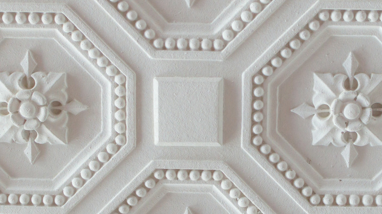 Embossed white ceiling tile